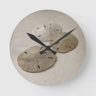 Reloj Redondo Mediano Dólares de arena inspirados en la cosecha