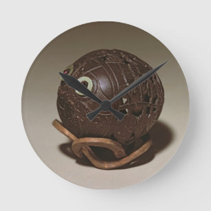 Reloj Redondo Mediano El coco esculpió en una cara, c.1895
