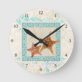 Reloj Redondo Mediano El mar de las estrellas de mar descasca la playa