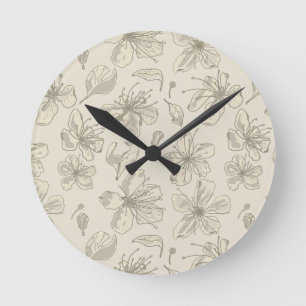 Reloj Redondo Mediano Flores esparcidas sobre arena ligera - patrón cont