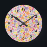Reloj Redondo Mediano Flores salvajes de pop de color<br><div class="desc">Color Pop Flores silvestres presenta flores de color claro y alegre dibujadas a mano que incluyen rosados,  naranjas,  moradas,  amarillos y verdes. Añade un toque de color a tu decoración con decoración casera de nuestra Colección Pop de colores! Mezclar y hacer juego.</div>