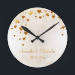 Reloj Redondo Mediano Gold Hearts and Snowflakes Wedding Memento<br><div class="desc">An elegant design for a winter wedding featuring golden cascading hearts on a background of swirls and snowflakes. The color of the text coordinates with the color of the gold colored hearts. Fully customizable for your own special occasion. This coordinates with the Gold Hearts and Snowflakes Wedding Collection. If you...</div>