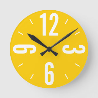 Reloj Redondo Mediano Grandes números modernos de amarillo y blanco