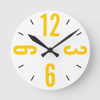 Reloj Redondo Mediano Grandes números modernos de amarillo y negro
