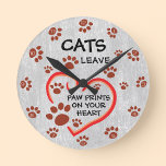 Reloj Redondo Mediano Los gatos dejan huellas de pata en tu corazón deco<br><div class="desc">Añade un toque de encanto felino a tu casa con este adorable reloj de pared. Con la frase "los gatos dejan huellas de pata en tu corazón" junto con ilustraciones de huellas de pata marrón y un corazón de arte de línea tortuosa, este reloj seguro deleitará a los amantes de...</div>