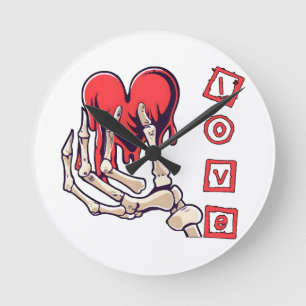 Reloj Redondo Mediano Mano de esqueleto simbólico del amor que ofrece co
