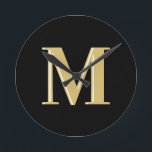 Reloj Redondo Mediano Moderno monograma tipografía oro negro<br><div class="desc">Moderno monograma tipografía oro negro</div>