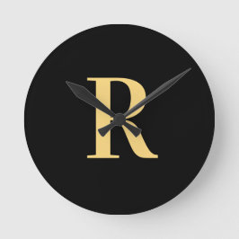 Reloj Redondo Mediano Monograma simple oro negro moderno