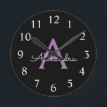 Reloj Redondo Mediano Morado Black Script Girly Monograma Nombre<br><div class="desc">Reloj de nombres de monograma de escritura simple púrpura y negra. Esto hace que el dulce perfecto cumpleaños 16,  boda,  ducha de novia,  aniversario,  ducha de bebé o fiesta de soltera sea regalo para alguien que ama el lujo glam y los estilos de moda.</div>