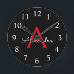 Reloj Redondo Mediano Nombra de monograma de guión negro rojo<br><div class="desc">Reloj de nombres de monograma de escritura simple rojo y negro. Esto hace que el dulce perfecto cumpleaños 16,  boda,  ducha de novia,  aniversario,  ducha de bebé o fiesta de soltera sea regalo para alguien que ama el lujo glam y los estilos de moda.</div>