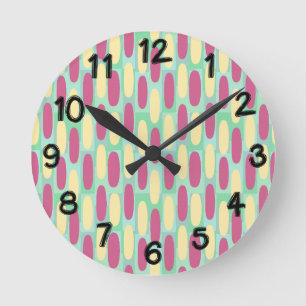Reloj Redondo Mediano Ovalos amarillos y rosados
