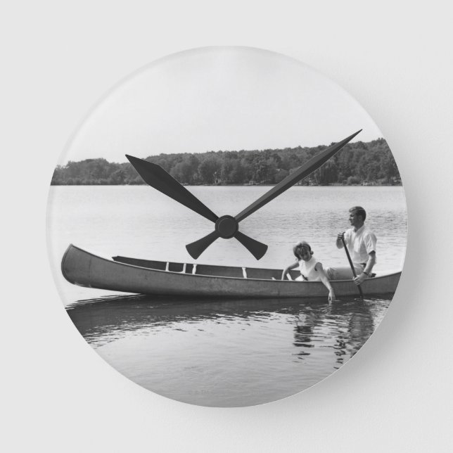 Reloj Redondo Mediano Pares en una canoa (Anverso)