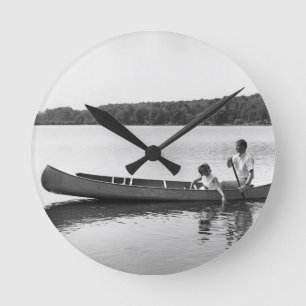 Reloj Redondo Mediano Pares en una canoa
