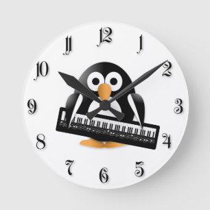 Reloj Redondo Mediano Pingüino con el piano