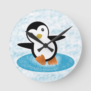 Reloj Redondo Mediano Pingüino patinando en la nieve