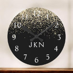 Reloj Redondo Mediano Purpurina negro de oro Monograma Girly Iniciales<br><div class="desc">Reloj de nombres de monograma cepillado por Purpurina de espuma negra y dorada. Esto hace que el dulce perfecto cumpleaños 16,  boda,  ducha de novia,  aniversario,  ducha de bebé o fiesta de soltera sea regalo para alguien que ama el lujo glam y los estilos de moda.</div>