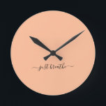 Reloj Redondo Mediano Respira yoga de escritura elegante y naranja<br><div class="desc">Reloj de yoga moderno con fondo de naranja de moda (melocotón) y un elegante guión negro con letras a mano con la frase "solo respira".</div>