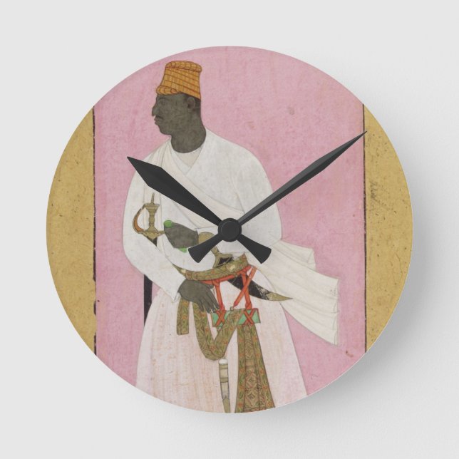 Reloj Redondo Mediano Retrato de Malik Amber, inscrito en Deva (Anverso)