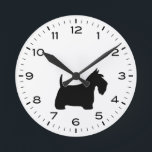 Reloj Redondo Mediano Silueta de perro escocés de Terrier<br><div class="desc">Un divertido reloj de pared de Scottish Terrier para la casa o la oficina. Hace un regalo original para los amantes del perro escocés. Echa un vistazo al Doodle World de Jenn para ver más relojes decorativos y decoración de casa con temática de raza de perro.</div>