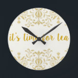 Reloj Redondo Mediano Tiempo de té<br><div class="desc">Este reloj elegante y simple siempre te dirá a qué hora es. Hace un gran regalo para cualquiera que disfrute de una buena taza de té, o que sea dueño de una tienda de té. El pedido es seguro, sencillo, rápido y divertido. Como nosotros: facebook.com/ShopJandL Asegúrate de navegar por todas...</div>