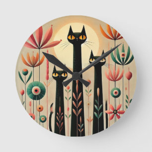 Reloj Redondo Mediano Tres gatos negros en medio de un vibrante diseño f