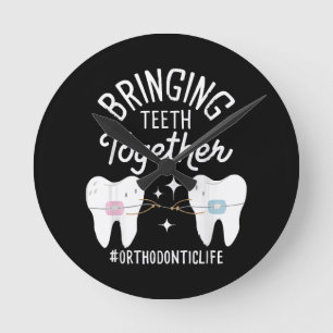 Reloj Redondo Mediano Uniendo Dientes - Ortodoncista