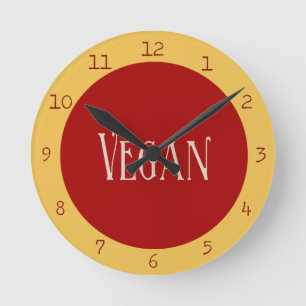 Reloj Redondo Mediano Vegano en un círculo rojo