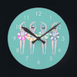 Reloj Redondo Mediano Vintage Artistic Swimming Swift Ring Pool<br><div class="desc">Con un moderno y fresco ilustracion de mujeres sincronizadas nadadoras artísticas con anillos de piscina de colores retro. Nadadores de St. Tropez. Los nadadores artísticos presentan un diseño de colores pastel. Regalo del equipo de natación de Guay. obsequios de equipo de natación sincronizados, entrenador de equipo de natación sincronizado. El...</div>