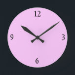 Reloj Redondo Mediano Wall Clock in Pink<br><div class="desc">This pink wall clock will look fabulous with more of the matching pillows,  serving trays,  picture frames and light switches in this store in the same bubble gum pink color.</div>