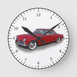 Reloj rojo clásico del coche de 1953