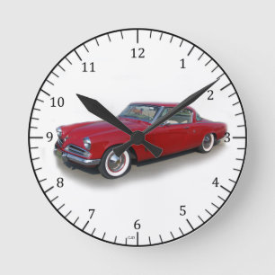 Reloj rojo clásico del coche de 1953