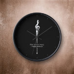 Reloj Treblemaker Funny Music Pun Classy Black G-Clef<br><div class="desc">Funny and punny in classy black and white, this clock is both stylish and witty with its music pun and custom options. Fun gift for the professional treblemakers / troublemakers in your life--aka: musicians, music teachers, choir directors, bandleaders and other musical mischiefs. The dripping G-clef is a unique take on...</div>