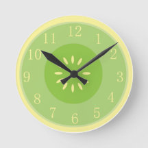 Reloj verde en colores pastel de la cocina de Guay