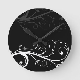 Relojes de pared floral en blanco y negro