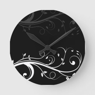 Relojes de pared floral en blanco y negro