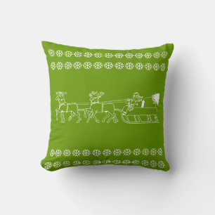 Reno y árbol de Santa en blanco sobre una almohada