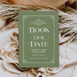 Reserva La Fecha Boda de la portada del libro de cosecha verde "Boo<br><div class="desc">Estas bodas únicas ahorran las tarjetas de fecha para los amantes de los libros, presentan un diseño de portada de libros vintage con rollos que enmarcan la fecha del boda, un título ornamental "Book Our Date", los nombres de Bride & Groom como autores, un fondo verde musgo / color de...</div>