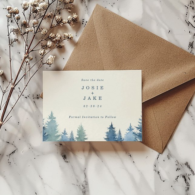 Reserva La Fecha Los pinos blandos ahorran la fecha (Soft pine trees save the date card with bride and groom name and date next to a brown envelope.)