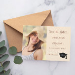 Reserva La Fecha Photo champagne mocha Graduation<br><div class="desc">A photo Save the date card for a graduation. On front: Add your own vertical size photo of the graduate. A modern champagne colored background, mocha colored text. Templates for a name and date. The name and the text: Save the Date are written with a modern hand lettered style script....</div>