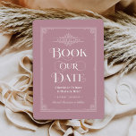 Reserva La Fecha Reserve nuestro Boda de portada de cosecha de Rosa<br><div class="desc">Estas bodas únicas ahorran las tarjetas de fecha para los amantes de los libros, presentan un diseño de portada de libros vintage con rollos que enmarcan la fecha del boda, un título ornamental "Book Our Date", los nombres de Bride & Groom como autores, un polvoriento color de libro/fondo rosado rosa...</div>