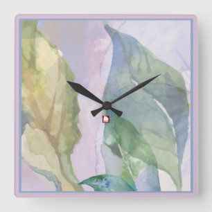 Retrato de una hoja azul dorada por reloj de pared