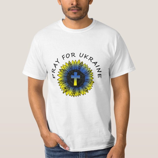 Rezar por Ucrania girasol y camiseta cruzada