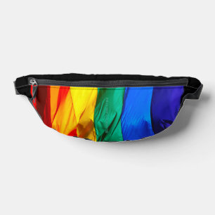 Riñoneras La bandera del orgullo gay de SlipperyJoe's ondean