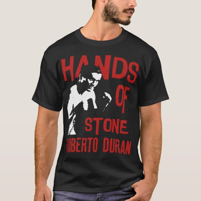 Roberto Duran que encajona las camisetas de (Anverso)