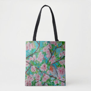 Robin en flor de cerezo en una bolsa