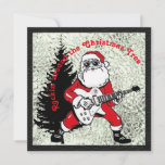 Rockin' alrededor de la tarjeta plana de árbol de<br><div class="desc">Rockin alrededor de la tarjeta plana de árbol de Navidad. Santa Jugando Una Tarjeta de Navidades de guitarra con fondo negro y plateado. Foto y texto editable. Cuero negro y plateado metálico. Tarjeta de navidad rock and Roll.</div>