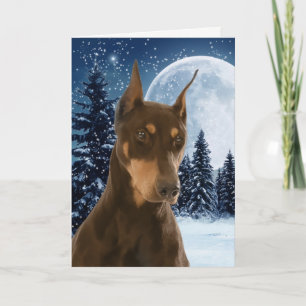 Rojo y tarjeta de Navidad del Doberman del moho