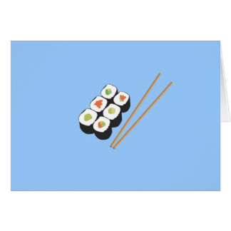 Rollos de sushi con los palillos