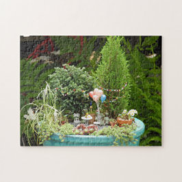 Rompecabezas con el jardín miniatura del