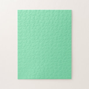 Rompecabezas con fondo verde de pinta pastel